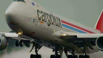 AMSTERDAM, THE NETHERLANDS JULY 24, 2017 - Cargolux Boeing 747 LX VCC flight CLX779 to Luxembourg LUX accelerate before departure at Polderbaan 36L, rainy weather, Shiphol Airport, Amsterdam, Holland video