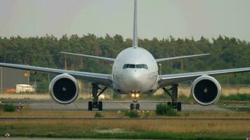 FRANKFURT AM MAIN, GERMANY JULY 18, 2017 - Boeing 777 FedEx Cargo N883FD flight FX3 from Munich MUC, taxiing after landing. Fraport, Frankfurt, Germany video