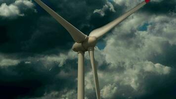 Wind turbine producing clean electric power for sustainable energy solutions video