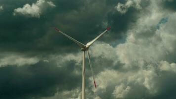 Wind turbine producing clean electric power for sustainable energy solutions video