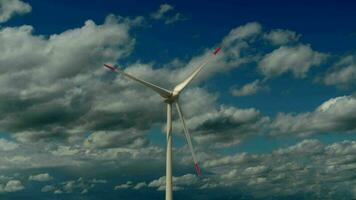 Wind turbine producing clean electric power for sustainable energy solutions video