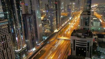 Time lapse of modern futuristic urban city skyline buildings and road cars traffic video