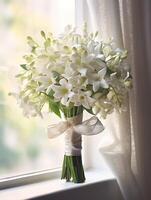 Stephanotis flower copy space blurred window background. photo