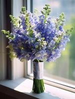 Blue delphinium flower copy space background. photo
