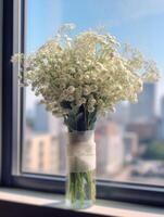 Babys breath flower copy space blurred window background. photo