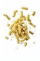 Falling raw fusilli uncooked italian pasta. photo