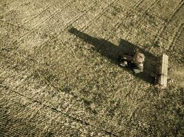 Tractor y maquinaria agricola , sembrando, La Pampa, Argentina photo