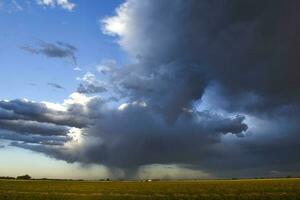 Threatening storm clouds, Pampas, Patagonia, Argentina photo