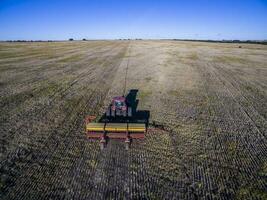 Tractor y maquinaria agricola , sembrando, La Pampa, Argentina photo