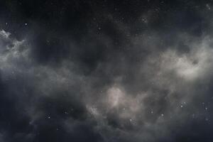 A black background with a cloud in the sky. photo