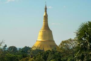 The Shwemawdaw pagoda the tallest stupa in Myanmar located in the downtown of Bago. photo