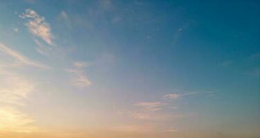 Beautiful view of sky with clouds at sunrise. Partly cloudy. Colorful sunset. Natural sky background texture, beautiful color. photo