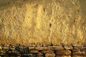 Soil wall texture of old clay house structure. One kind of material make house wall in North Vietnam photo