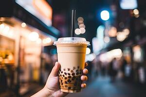 Generative AI illustration of hand holding Taiwan milk tea and blurry background photo