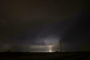 Electric storm in rural Pampas landscape, La Pampa Province, Patagonia, Argentina. photo