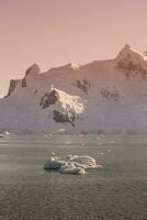 Sea and mountains landscape in Antarctica photo