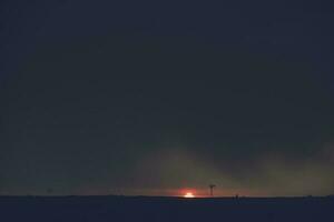 Pampas sunset landscape, La pampa, Argentina photo