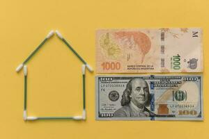 Buy a house, saving concept in dollars photo