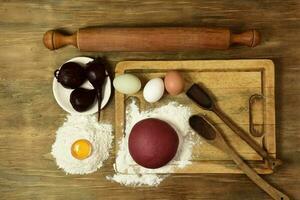 Purple dough bun for noodles with ingredients on the table. photo