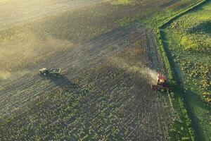 Harvester in Pampas Countryside, aerial view, La Pampa province, Argentina. photo