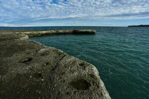 Coastal landscape with cliffs in Peninsula Valdes, World Heritage Site, Patagonia Argentina photo