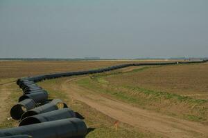 Gas pipeline construction, La Pampa province , Patagonia, Argentina. photo