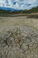 Broken dry soil in a Pampas lagoon, La Pampa province, Patagonia, Argentina. photo