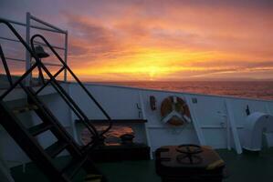 Expedition ship, cruise in Antarctic landscape, Paulet island, near the Antarctic Peninsula photo