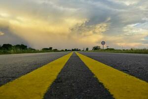 Route crossing the Pampas plain, La Pampa Province, Patagonia, Argentina. photo