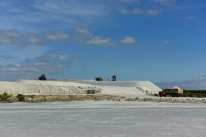 Extraction of raw material salt, from an open pit mine, La Pampa, Argentina photo