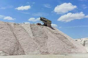 Extraction of raw material salt, from an open pit mine, La Pampa, Argentina photo