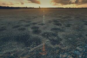 Broken dry soil in a Pampas lagoon, La Pampa province, Patagonia, Argentina. photo