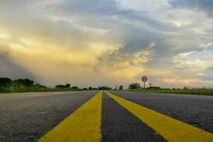 Route crossing the Pampas plain, La Pampa Province, Patagonia, Argentina. photo