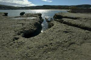 Coastal landscape with cliffs in Peninsula Valdes, World Heritage Site, Patagonia Argentina photo