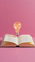 Book with light bulb. Lightbulb floating from open book on solid color background. AI Generated photo