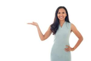 portrait of beautiful asian business woman holding open palms for making presentation, isolated on white background with copyspace photo