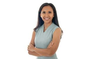 Portrait of asian caucasian young business woman with crossed arms isolated on white background photo