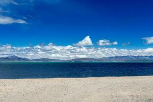 scenery Lake Manasarovar with blue sky. Place of prayer, calm and meditation.Tibet,Kailas photo