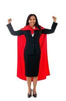 full length portrait of cheerful asian businesswoman dressed as superhero showing her fists, celebrates her success, isolated on white background photo