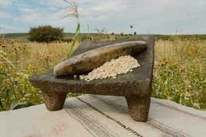 In Mexico, the metate is a symbol of tradition, connecting people with nature and food photo