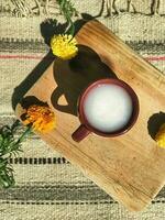 Mexican pulque, a refreshing drink from maguey, captured in a vibrant still life photo