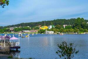 Da Lat, Viet Nam - 3 June 2023 Morning on the streets of Da Lat during summer vacation, tourists gather on the shores of Xuan Huong Lake photo