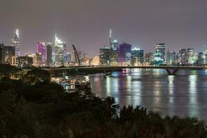 Ho Chi Minh, Viet Nam - 28 April 2023 night view to disttrict 1 of Ho Chi Minh city photo