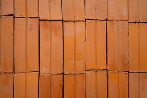 brick red wall. background of a old brick house. photo