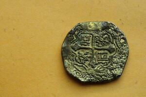 Gold And Silver Coins Laid Out on Display. photo