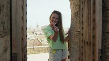 The girl shows the sign of the heart, enjoys life. video