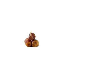 Pile of tasty dry dates isolated on white background photo