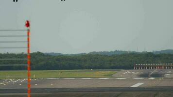 DUSSELDORF, GERMANY JULY 22, 2017 - FlyBe DASH 8 Q400 landing at sunset, slow motion. Dusseldorf airport, Germany video