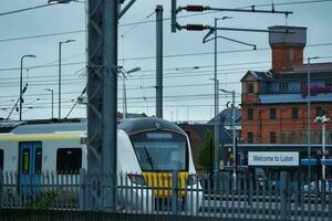 Beautiful Low Angle View of Train on Tracks at Central Railway Station of Luton England UK. Image Was Captured on May 06th, 2023 photo