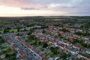 Aerial View of Luton Town of England during Most Beautiful Orange Sunset and Gorgeous Sky with Colourful Clouds. Image Was Captured with Drone's Camera on July 3rd, 2023 photo